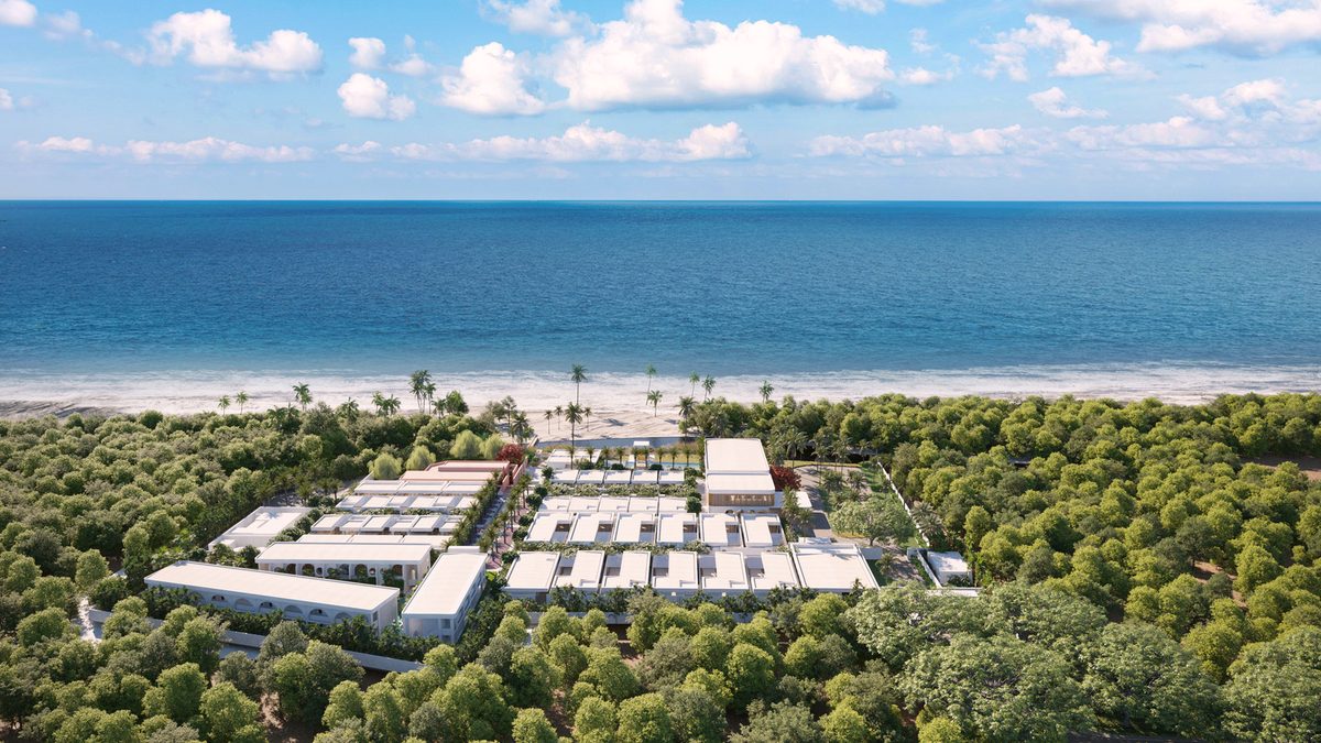Aerial view of Cora Beach Resort between forest and sea, Sabah